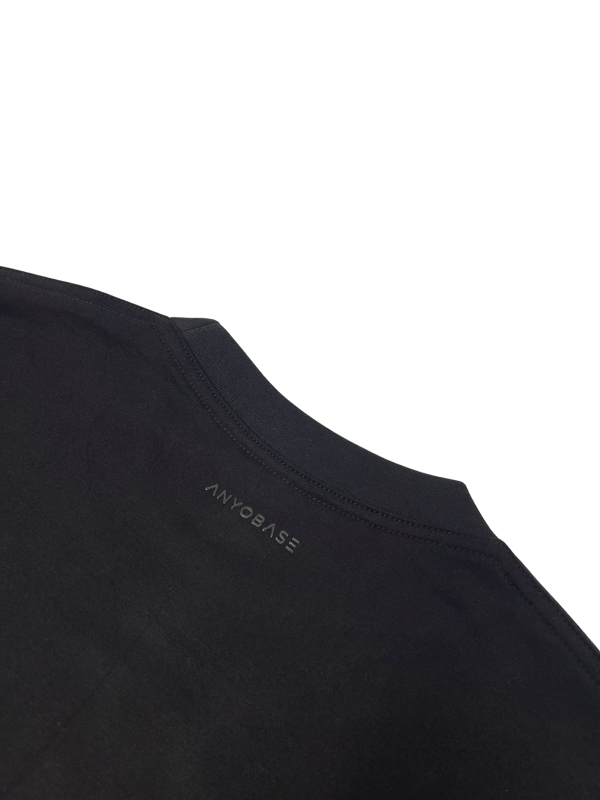 ANYOBASE Core Tee in Black featuring a tonal back-neck logo.